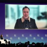 Elon Musk says he will spend a ‘lot less’ on politics