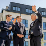Housing minister invites construction firms to express interest in building apartments